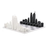 Acrylic Los Angeles architecture chess pieces by Skyline Chess on the marble hatch board