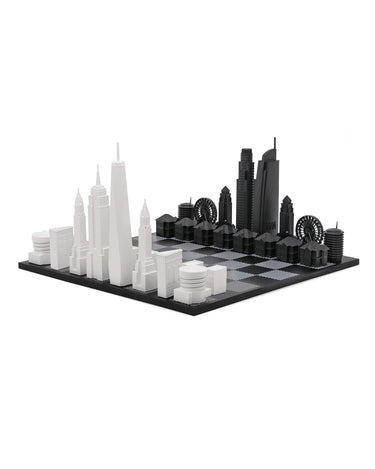 Acrylic New York vs Los Angeles architecture chess pieces by Skyline Chess on the wood hatch board
