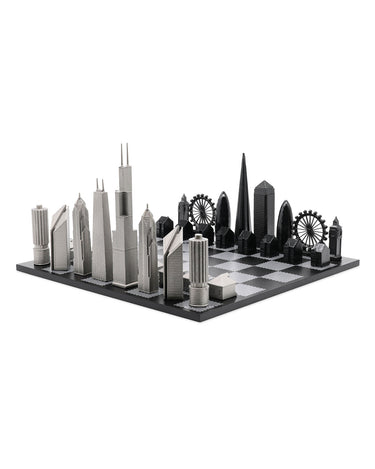Stainless Steel London vs Chicago architecture chess pieces by Skyline Chess on the black & white hatch board