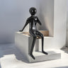 Finesse Decor Urban Thinker– Glossy Black Resin Seated Figure Sculpture