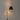 Modern plug-in wall lamp with black ribbon shade by Santa & Cole for bedroom bedside lighting