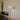 Diana floor lamp by Santa & Cole featuring a satin nickel metal frame