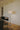Diana floor lamp by Santa & Cole featuring a satin nickel metal frame