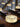 Chrome pendant chandelier with twelve white shades by Santa & Cole