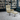 Timeout recliner by Conform in luxurious black leather with ergonomic footstool and swivel base