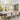 Linear 6 Brass Pendant Light Illuminating a Modern Living Room