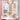 ET2 Sense mirror chrome flush mount in a bright breakfast nook with colorful geometric wallpaper and bay windows