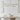Spectica aluminum LED chandelier with adjustable stem mount over dining taable