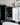 Visual Comfort 8-Light Linear LED Chandelier – Adjustable Arms, 3000K Warm Light, Modern Dining Area
