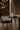 Oluce The Globe table lamp in a styled living room with armchairs