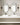 Dark Bronze Banda 24" wall sconce: Contemporary design for bathroom or powder room.