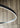 Sleek matte black LED ring pendant fixture from Visual Comfort, mounted on high ceiling
6.
