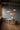 Three Natural Birch pendants lit over a long table | TR5 Pendant by Tom Rossau