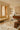 Paint wool rug in Ocre, styled in a room
