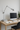 Tolomeo Mini swing arm wall sconce in contemporary hallway, adjustable designer wall task lamp