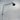 Adjustable plug-in wall lamp with on-head switch and stainless tension cables for precise directional lighting