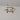 Trace Circular Halo chandelier with two stacked tiers of curved bronze strands and glass shades, studio view