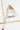 Midrand Crystal 52 Chandelier by Sean Lavin in Hand-Rubbed Antique Brass, first close view of a crystal diffuser and brass cone