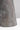 Close-up of the Dark Travertine base of the Aegis Medium table lamp showing the natural veining