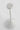 Detail of the Moneta Short Accent lamp's Matte White disc head and stem