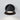 Midrand 4 Task Sconce by Sean Lavin in Nightshade Black, lit on a wall, front view