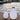 Vessel 2S and Vessel 2 Bluetooth LED Cordless Lamps by Smart & Green in white side by side on a waterfront dock - LoftModern