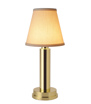 Rechargeable accent lamp, Victoria model, on dining table, creating warm ambient light.