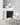 Contemporary chandelier with brass arms and opal glass shades for upscale home or office lighting