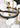 Opal glass and brass finish chandelier for ambient lighting in dining areas, offices, or hotel lounges