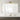 Slim profile LED mirror light bar in plated brass finish by Visual Comfort