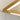 Large linear suspension chandelier in natural brass finish for dining or business settings