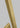 Natural brass LED wall sconce for commercial interiors with 64.1 inch vertical mounting option