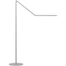 Z-Bar Gen 4 matte black LED floor lamp next to a modern armchair for reading.