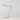 Compact LED desk light with adjustable arm for small space workstations