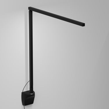 Z-Bar Solo Gen 4 in matte black, a modern LED wall light for an office or study area.