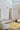 Alpha wool rug in Yellow, styled in a room