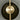 Close-up of a Pendulum pendant light in satin brass seen from above, with a smoked glass shade