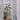 Bird Mobile Medium, Blue by Eguchi Toys, hanging in a bright hallway