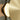 Close-up of the satin brass disc and smoked glass shade of the Pendulum wall light