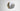 Lucid wall light with silvered oxidised brass band and honed alabaster dome, side view