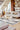 Ciutadella jute rug in Blue, styled in a room