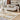 Ciutadella jute rug in Gold, styled in a room
