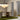 Large Cloudesley chandelier in bronze hanging over a dining table with a marble base