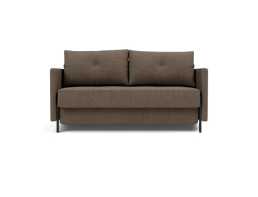Cubed sleeper upholstered in Esina Cedar Brown, studio shot