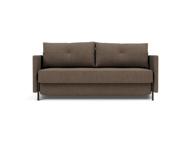 Cubed sleeper upholstered in Esina Cedar Brown, studio shot