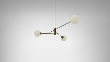Trevi pendant in bronze with 3 matt opal glass globes on slim arms, studio view