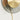 Close-up of the Pendulum pendant light with its stem and smoked glass shade