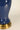 Elijah midnight blue ceramic cordless table lamp with off-white linen shade