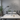 Contemporary office showing Tolomeo LED lamps on white drafting desks with architectural floor plans.