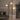 Array floor lamp with lit opal glass spheres in a room